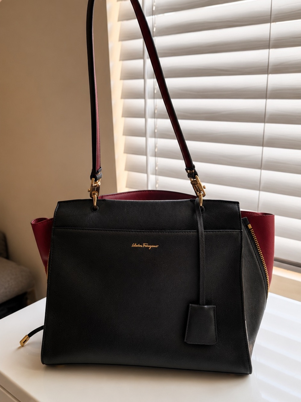 Salvatore Ferragamo Black and Burgundy Top-Handle Women's Bag with Gold Hardware - Picture 3 of 6